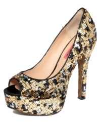 Glistening glamor. Betsey Johnson's Shiner platform pumps are completely covered in the most sparkly sequins and feature a classic platform and towering heel. Glistening glamor. Betsey Johnson's Shiner platform pumps are completely covered in the most sparkly sequins and feature a classic platform and towering heel.
