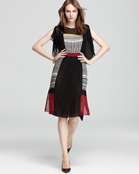 Classic primary colors feel fashion forward on BCBGMAXAZRIA's color blocked, split-sleeved midi dress. Classic primary colors feel fashion forward on BCBGMAXAZRIA's color blocked, split-sleeved midi dress.