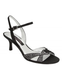 Sensible and sparkly. With rhinestone detail and a small covered heel, the Germaine sandals by Nina feature just the right combination of satin sparkle and walkable comfort. Sensible and sparkly. With rhinestone detail and a small covered heel, the Germaine sandals by Nina feature just the right combination of satin sparkle and walkable comfort.