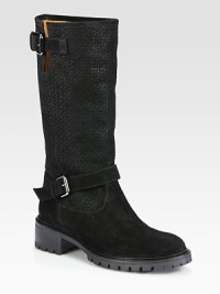 Double adjustable straps top this military-inspired silhouette made of logo-embossed suede. Stacked heel, 1½ (40mm)Shaft, 10Leg circumference, 13Suede upperPull-on styleLeather liningRubber trek solePadded insoleMade in ItalyOUR FIT MODEL RECOMMENDS ordering one half size up as this style runs small. Double adjustable straps top this military-inspired silhouette made of logo-embossed suede. Stacked heel, 1½ (40mm)Shaft, 10Leg circumference, 13Suede upperPull-on styleLeather liningRubber trek solePadded insoleMade in ItalyOUR FIT MODEL RECOMMENDS ordering one half size up as this style runs small.