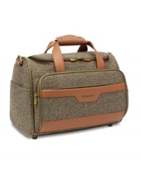 Lend your travels a look of distinction with Hartmann's handsome cosmetic tote. Outfitted in sophisticated tweed with rich, leather accents, you'll be able to organize your belongings for journeys both short and long. Lifetime warranty. Lend your travels a look of distinction with Hartmann's handsome cosmetic tote. Outfitted in sophisticated tweed with rich, leather accents, you'll be able to organize your belongings for journeys both short and long. Lifetime warranty.