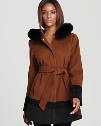 An eye-catching Ellen Tracy coat complete with rich color-block details and a lofty fox fur ruff crafted in an exceptionally soft wool. Change the shape from relaxed to cinched with a versatile and detachable tie belt. An eye-catching Ellen Tracy coat complete with rich color-block details and a lofty fox fur ruff crafted in an exceptionally soft wool. Change the shape from relaxed to cinched with a versatile and detachable tie belt.