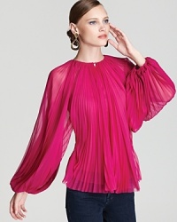 Dramatic accordion pleats add classic flair to this soft-as-silk DIANE von FURSTENBERG top. Dramatic accordion pleats add classic flair to this soft-as-silk DIANE von FURSTENBERG top.