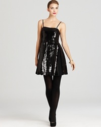 A vision in sequins, this glamorous French Connection dress eliminates the guesswork of what to wear to the party ina glamorous strappy silhouette. A vision in sequins, this glamorous French Connection dress eliminates the guesswork of what to wear to the party ina glamorous strappy silhouette.