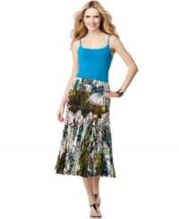 A bold, exotic print adds an on-trend touch to Grace Elements' broomstick skirt! Perfect for pairing with tanks and tees. A bold, exotic print adds an on-trend touch to Grace Elements' broomstick skirt! Perfect for pairing with tanks and tees.