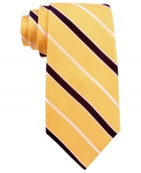 You'll never go wrong with this crisp classic striped tie from Tommy Hilfiger. You'll never go wrong with this crisp classic striped tie from Tommy Hilfiger.