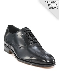 Cap toe wing tip in luxurious Italian leather. Cap toe wing tip in luxurious Italian leather.