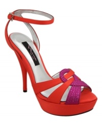 Colorblocking with a glitzy twist. Rhinestones on the toe of the Samuel evening sandals by Nina will transform any dress in your closet--be it elegant and formal or date-night sassy. Colorblocking with a glitzy twist. Rhinestones on the toe of the Samuel evening sandals by Nina will transform any dress in your closet--be it elegant and formal or date-night sassy.