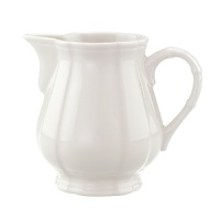 The Villeroy & Boch Manoir dinnerware collection offers mannered elegance with simple modern shapes that respect craft and classic design. With a scalloped edge, this fine creamer brings sophistication to tea time, adding another dimension to your complete table setting. The Villeroy & Boch Manoir dinnerware collection offers mannered elegance with simple modern shapes that respect craft and classic design. With a scalloped edge, this fine creamer brings sophistication to tea time, adding another dimension to your complete table setting.