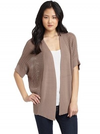 THE LOOKOpen weave designShawl collar with open frontThree-quarter length ribbed cuff dolman sleevesRibbed hemTHE FITAbout 28 from shoulder to hemTHE MATERIAL55% cotton/45% acrylicCARE & ORIGINHand washImportedModel shown is 5'10 (177cm) wearing US size Small. THE LOOKOpen weave designShawl collar with open frontThree-quarter length ribbed cuff dolman sleevesRibbed hemTHE FITAbout 28 from shoulder to hemTHE MATERIAL55% cotton/45% acrylicCARE & ORIGINHand washImportedModel shown is 5'10 (177cm) wearing US size Small.