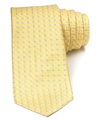 Bright color is balanced by the classic shape and design of this exceptionally soft tie, rendered in premium Italian silk for a luxurious addition to your fine dress shirting. Bright color is balanced by the classic shape and design of this exceptionally soft tie, rendered in premium Italian silk for a luxurious addition to your fine dress shirting.