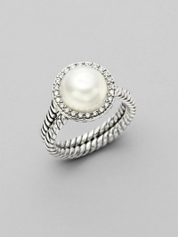 From the Pearl Cable Wrap Collection. A circle of pavé diamonds surround a delicate pearl, freshwater and naturally-hued, with two cabled bands of sterling silver. 10mm white pearl Diamonds, 0.24 tcw Sterling silver Imported From the Pearl Cable Wrap Collection. A circle of pavé diamonds surround a delicate pearl, freshwater and naturally-hued, with two cabled bands of sterling silver. 10mm white pearl Diamonds, 0.24 tcw Sterling silver Imported