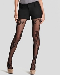 Forgo that mini skirt for these equally flirtatious cuffed shorts from Alice + Olivia. Sheer lace tights lend the perfect final touch. Forgo that mini skirt for these equally flirtatious cuffed shorts from Alice + Olivia. Sheer lace tights lend the perfect final touch.