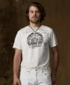 The wear-it-with-anything ease of an essential cotton jersey tee is enhanced with faded vintage-inspired graphics.