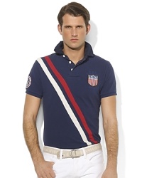 Cut for a trim, modern fit from breathable cotton mesh, a handsome rugby shirt is emboldened with country details to celebrate Team USA's participation in the 2012 Olympic Games. Cut for a trim, modern fit from breathable cotton mesh, a handsome rugby shirt is emboldened with country details to celebrate Team USA's participation in the 2012 Olympic Games.