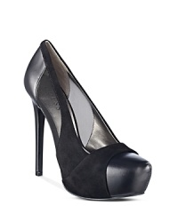 Upgrade your basic black pumps to a vampy, platform style with subtle mesh cutouts. By GUESS. Upgrade your basic black pumps to a vampy, platform style with subtle mesh cutouts. By GUESS.