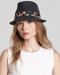 Aqua's untamed topper adds exotic flair to even the most basic ensembles. Aqua's untamed topper adds exotic flair to even the most basic ensembles.