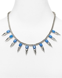This Aqua statement necklace has a rebel yell, featuring an edgy mash-up of crystals and spikes. It totally turns every look up loud. This Aqua statement necklace has a rebel yell, featuring an edgy mash-up of crystals and spikes. It totally turns every look up loud.