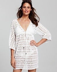 Lace to the finish with this tunic from Milly. Lovely and lightweight, this pop-over keeps you covered while hinting at the suit that lies beneath.