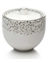 Fringed with shimmering leaves of platinum and mica, this bone china covered sugar bowl turns your table into a springtime utopia. Its sleek shape and smooth lid are a vision of modern elegance in platinum-banded white. Fringed with shimmering leaves of platinum and mica, this bone china covered sugar bowl turns your table into a springtime utopia. Its sleek shape and smooth lid are a vision of modern elegance in platinum-banded white.