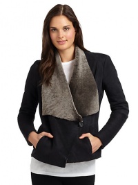 THE LOOKFlap collarAsymmetric button closureKnit insets along sleevesDual seam pocketsTHE FITAbout 26 from shoulder to hemTHE MATERIALDyed shearlingGenuine sheepskinCARE & ORIGINDry clean by fur specialistFur origin: SpainImportedModel shown is 5'9½ (176cm) wearing US size Small. THE LOOKFlap collarAsymmetric button closureKnit insets along sleevesDual seam pocketsTHE FITAbout 26 from shoulder to hemTHE MATERIALDyed shearlingGenuine sheepskinCARE & ORIGINDry clean by fur specialistFur origin: SpainImportedModel shown is 5'9½ (176cm) wearing US size Small.
