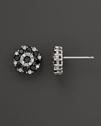 Diamonds in a 14K white gold floral setting. Diamonds in a 14K white gold floral setting.