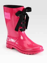 High-shine rainboot has contrasting laces and a height that hits just below the calf. Rubber heel, 1 (25mm)Shaft, 8½Leg circumference, 14Rubber upperLeather liningRubber solePadded insoleMade in Italy High-shine rainboot has contrasting laces and a height that hits just below the calf. Rubber heel, 1 (25mm)Shaft, 8½Leg circumference, 14Rubber upperLeather liningRubber solePadded insoleMade in Italy