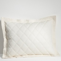 A timeless collection of luxury bedding lends modern elegance to any bedroom with iconic patterns and tailored details in a sophisticated color palette. A timeless collection of luxury bedding lends modern elegance to any bedroom with iconic patterns and tailored details in a sophisticated color palette.