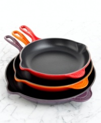The skillet has been long known as the workhorse of kitchens from breakfast to dinner bells. Crafted with a cast iron exterior for uniform heating and even cooking, it's perfect for browning and searing and the satin black enamel interior will seal in juices and flavors for succulent, tender meats and poultry. Ideal for sautéing vegetables and broiling fish, too. Sloping sides promote rapid moisture evaporation and help prevent splatter. Assist handle allows easier lifting. Limited lifetime warranty. The skillet has been long known as the workhorse of kitchens from breakfast to dinner bells. Crafted with a cast iron exterior for uniform heating and even cooking, it's perfect for browning and searing and the satin black enamel interior will seal in juices and flavors for succulent, tender meats and poultry. Ideal for sautéing vegetables and broiling fish, too. Sloping sides promote rapid moisture evaporation and help prevent splatter. Assist handle allows easier lifting. Limited lifetime warranty.