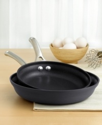 Light and fluffy or filled to the brim with tasty toppings, make omelettes easy anytime with this exquisite set of Calphalon® nonstick pans. Hard-anodized, medium- to heavy-gauge aluminum construction ensures exceptional results, while the nonstick interior never fails to make cooking and cleanup a breeze. Lifetime warranty. Light and fluffy or filled to the brim with tasty toppings, make omelettes easy anytime with this exquisite set of Calphalon® nonstick pans. Hard-anodized, medium- to heavy-gauge aluminum construction ensures exceptional results, while the nonstick interior never fails to make cooking and cleanup a breeze. Lifetime warranty.
