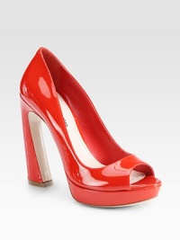 Patent leather platform peep toe with an architectural flared heel. Self-covered heel, 5 (125mm)Covered platform, 1 (25mm)Compares to a 4 heel (100mm)Patent leather upperLeather lining and solePadded insoleMade in ItalyOUR FIT MODEL RECOMMENDS ordering one half size up as this style runs small. Patent leather platform peep toe with an architectural flared heel. Self-covered heel, 5 (125mm)Covered platform, 1 (25mm)Compares to a 4 heel (100mm)Patent leather upperLeather lining and solePadded insoleMade in ItalyOUR FIT MODEL RECOMMENDS ordering one half size up as this style runs small.