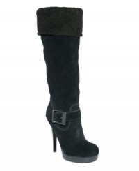 On a roll! Rollover shearling embellishment and buckle hardware embellishment add decorative detailing to GUESS' tall platform boots. Made in suede with a high stacked heel, they're available in black and brown. On a roll! Rollover shearling embellishment and buckle hardware embellishment add decorative detailing to GUESS' tall platform boots. Made in suede with a high stacked heel, they're available in black and brown.