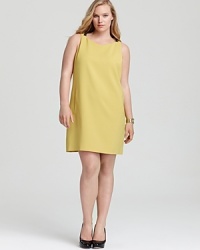 In vibrant saffron, this Tahari Woman Plus dress lends exotic spice to your summer repertoire. A snakeskin accent at the neckline inspires a sense of sartorial adventure. In vibrant saffron, this Tahari Woman Plus dress lends exotic spice to your summer repertoire. A snakeskin accent at the neckline inspires a sense of sartorial adventure.