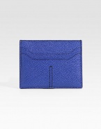 A sleek, slim-line credit card case designed in textured leather. Top-loading currency pocket Two card slots 4 X 3 Made in Italy 