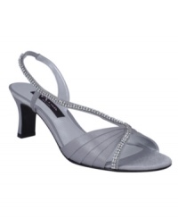 Twinkling with a swath of sparkling rhinestones, the Galloy evening sandals by Nina are the perfect finishing touch for your ensemble. Twinkling with a swath of sparkling rhinestones, the Galloy evening sandals by Nina are the perfect finishing touch for your ensemble.