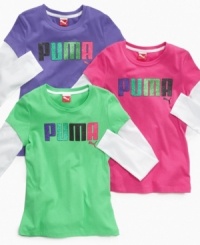Warm long sleeves gives these glitter graphic slider tees from Puma a cozy feel. Warm long sleeves gives these glitter graphic slider tees from Puma a cozy feel.