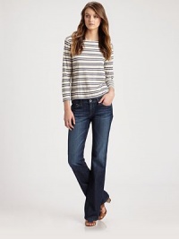 Dark rinse denim, lightly whiskered and faded in a petite bootcut silhouette.THE FITFitted through hips and thighsRise, about 7¼Inseam, about 30THE DETAILSZip flyFive-pocket styleSignature stitch back patch pockets70% cotton/28% lyocell/2% polyurethaneMachine washMade in USA of imported fabricModel shown is 5'9½ (176cm) wearing US size 4. Dark rinse denim, lightly whiskered and faded in a petite bootcut silhouette.THE FITFitted through hips and thighsRise, about 7¼Inseam, about 30THE DETAILSZip flyFive-pocket styleSignature stitch back patch pockets70% cotton/28% lyocell/2% polyurethaneMachine washMade in USA of imported fabricModel shown is 5'9½ (176cm) wearing US size 4.