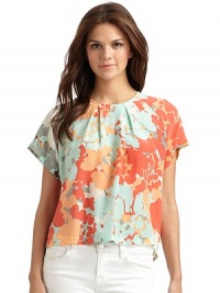 THE LOOKAllover floral printGentle pleatingShort sleevesAsymmetric slit in back with dual button closureTHE FITAbout 19 from shoulder to hemTHE MATERIALSilkCARE & ORIGINDry cleanMade in USAModel shown is 5'10 (177cm) wearing US size Small. THE LOOKAllover floral printGentle pleatingShort sleevesAsymmetric slit in back with dual button closureTHE FITAbout 19 from shoulder to hemTHE MATERIALSilkCARE & ORIGINDry cleanMade in USAModel shown is 5'10 (177cm) wearing US size Small.