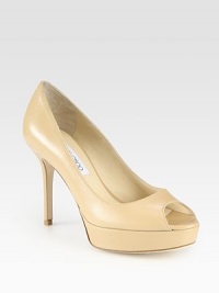 A sturdy platform lifts this signature peep toe design in luxurious Italian leather. Self-covered heel, 4 (100mm)Covered platform, 1 (25mm)Compares to a 3 heel (75mm)Leather upperPeep toeLeather lining and solePadded insoleMade in Italy A sturdy platform lifts this signature peep toe design in luxurious Italian leather. Self-covered heel, 4 (100mm)Covered platform, 1 (25mm)Compares to a 3 heel (75mm)Leather upperPeep toeLeather lining and solePadded insoleMade in Italy