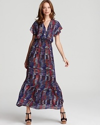 Imbued with a vibrant print, this Dolce Vita maxi dress is flourished with a ruffle at the hem for a feminine finish. Imbued with a vibrant print, this Dolce Vita maxi dress is flourished with a ruffle at the hem for a feminine finish.