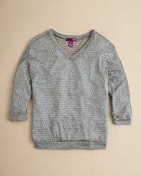 A sparkly metallic top in a fun, honeycomb patterned knit-layer over a bright tee for an extra pop of color. A sparkly metallic top in a fun, honeycomb patterned knit-layer over a bright tee for an extra pop of color.