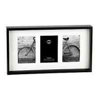 Preserve and present treasured photos in Prinz's black pine wood frame. White beveled matting highlights three images while the shadow box design adds depth and dimension. Preserve and present treasured photos in Prinz's black pine wood frame. White beveled matting highlights three images while the shadow box design adds depth and dimension.