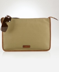 A sleek leather-trimmed canvas construction makes this portfolio a polished pick for stowing and transporting important documents. A sleek leather-trimmed canvas construction makes this portfolio a polished pick for stowing and transporting important documents.