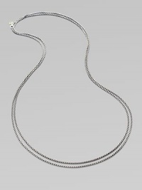 From the Chain collection. Elegant yet sturdy, this double strand of sterling silver features a 14k yellow gold logo at the clasp.Sterling silver 14k yellow gold Length, about 18 when doubled Lobster clasp Imported From the Chain collection. Elegant yet sturdy, this double strand of sterling silver features a 14k yellow gold logo at the clasp.Sterling silver 14k yellow gold Length, about 18 when doubled Lobster clasp Imported