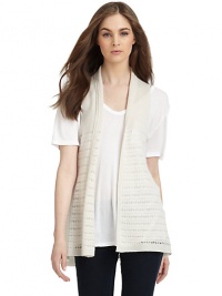 THE LOOKSleevelessPointelle details, front and backOpen frontRibbed trimTHE FITAbout 25 from shoulder to hemTHE MATERIALCashmereCARE & ORIGINDry cleanImportedModel shown is 5'8½ (174cm) wearing US size Small. THE LOOKSleevelessPointelle details, front and backOpen frontRibbed trimTHE FITAbout 25 from shoulder to hemTHE MATERIALCashmereCARE & ORIGINDry cleanImportedModel shown is 5'8½ (174cm) wearing US size Small.