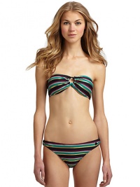 THE LOOKMultistripe print with metallic touchesBandeau top gathered at center with O-ringPadded cups with side boningLogo-embossed button at sideBack clasp closureTHE MATERIAL80% nylon/20% spandexFully linedCARE & ORIGINHand washImportedPlease note: Bikini bottom sold separately. THE LOOKMultistripe print with metallic touchesBandeau top gathered at center with O-ringPadded cups with side boningLogo-embossed button at sideBack clasp closureTHE MATERIAL80% nylon/20% spandexFully linedCARE & ORIGINHand washImportedPlease note: Bikini bottom sold separately.
