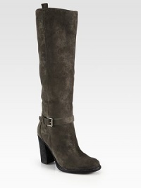 Powerful silhouette crafted of distressed suede, finished with a buckle strap and stacked heel. Stacked heel, 3¾ (95mm)Shaft, 15¾Leg circumference, 13½Distressed leather upperPull-on styleAdjustable buckle strapLeather lining and solePadded insoleImported Powerful silhouette crafted of distressed suede, finished with a buckle strap and stacked heel. Stacked heel, 3¾ (95mm)Shaft, 15¾Leg circumference, 13½Distressed leather upperPull-on styleAdjustable buckle strapLeather lining and solePadded insoleImported