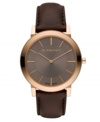 This Burberry timepiece features a brown leather strap and round rose-gold ion-plated stainless steel case with sapphire crystal. Textured taupe dial with smooth sunray inner dial features rose-gold tone stick indices, two hands and logo. Swiss quartz movement. Water resistant to 30 meters. Two-year limited warranty. This Burberry timepiece features a brown leather strap and round rose-gold ion-plated stainless steel case with sapphire crystal. Textured taupe dial with smooth sunray inner dial features rose-gold tone stick indices, two hands and logo. Swiss quartz movement. Water resistant to 30 meters. Two-year limited warranty.