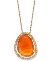 A splash of citrus spices up any look. Crafted in 14k gold over sterling silver, this asymmetrical carnelian stone (6-1/2 ct. t.w.) pops against a sparkling diamond frame (1/5 ct. t.w.). Approximate length: 18 inches. Approximate drop: 3/4 inch. A splash of citrus spices up any look. Crafted in 14k gold over sterling silver, this asymmetrical carnelian stone (6-1/2 ct. t.w.) pops against a sparkling diamond frame (1/5 ct. t.w.). Approximate length: 18 inches. Approximate drop: 3/4 inch.