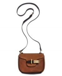 Elegance is all about the details and this Calvin Klein crossbody has it in spades. From the polished gold-tone hardware to the delicate accent stitching, this silhouette is a season essential. Elegance is all about the details and this Calvin Klein crossbody has it in spades. From the polished gold-tone hardware to the delicate accent stitching, this silhouette is a season essential.